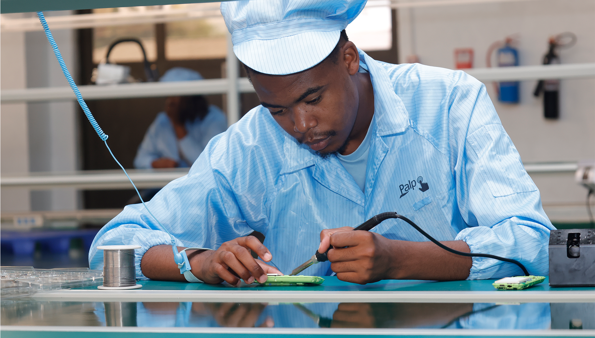 Palpo technician assembling a smart device